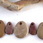 Drilled pebbles. Rocks from..