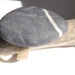 Stone pebble ring. Beach pe..