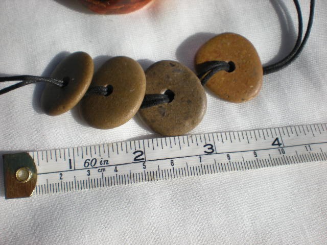 Drilled pebble beads from the Mediterranean. 4 centre drilled beach rocks by Oceangifts